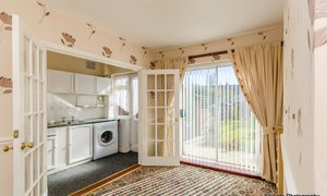 Simple Real estate image sunny dining room blinds.jpg