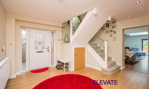 red rug hallway entrance for Dixons in Willenhall.jpg